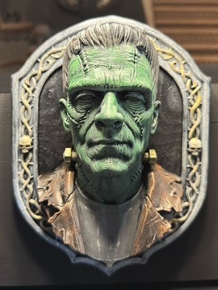 Angled view of Frank bust showing stitched scars and jacket