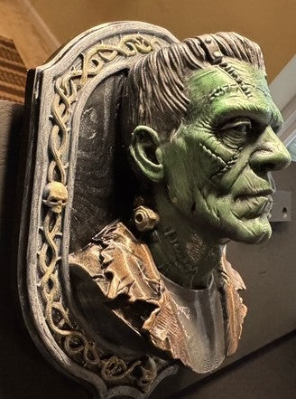 Frank monster wall plaque displayed on a wall