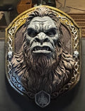 Front view of Sasquatch bust wall plaque with sculpted fur and ornate frame