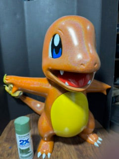 Life-size Charmander 3D printed statue hand painted, shown next to a spray can for scale reference