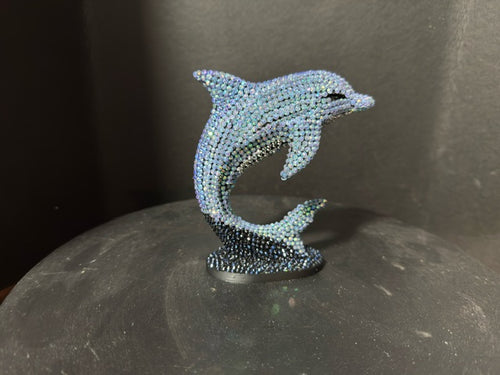 Side view of Celestial Tide showing full leap pose and bead texture