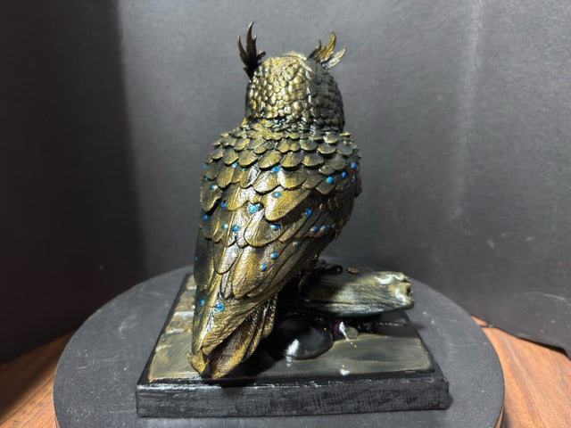 Forest Guardian Owl - rear view showing dense scale armor texture and blue gem accents