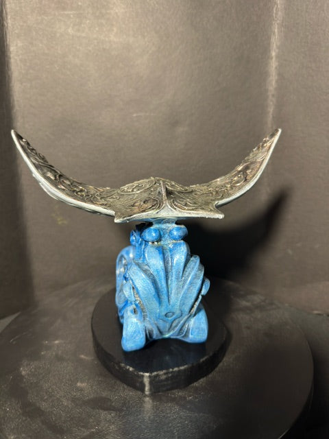 Filigree manta ray statue rear view — filigree wing detailing and wave base