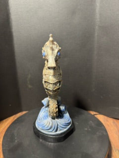 Ornate seahorse statue back view