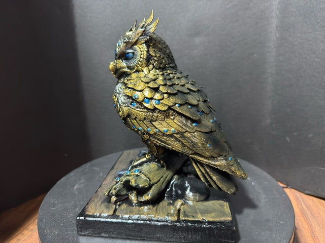 Forest Guardian Owl - side view showing full layered scale-armor feathers and sapphire gem accents
