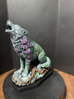 Ornate howling wolf statue detail view